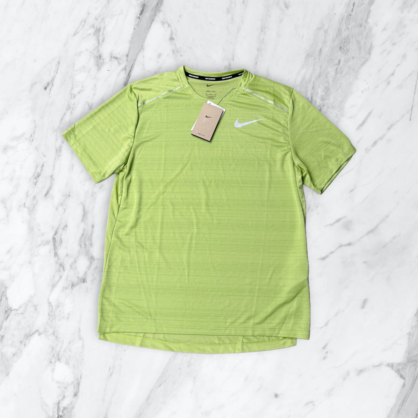 NIKE MILER 1.0 T-SHIRT -
KIWI